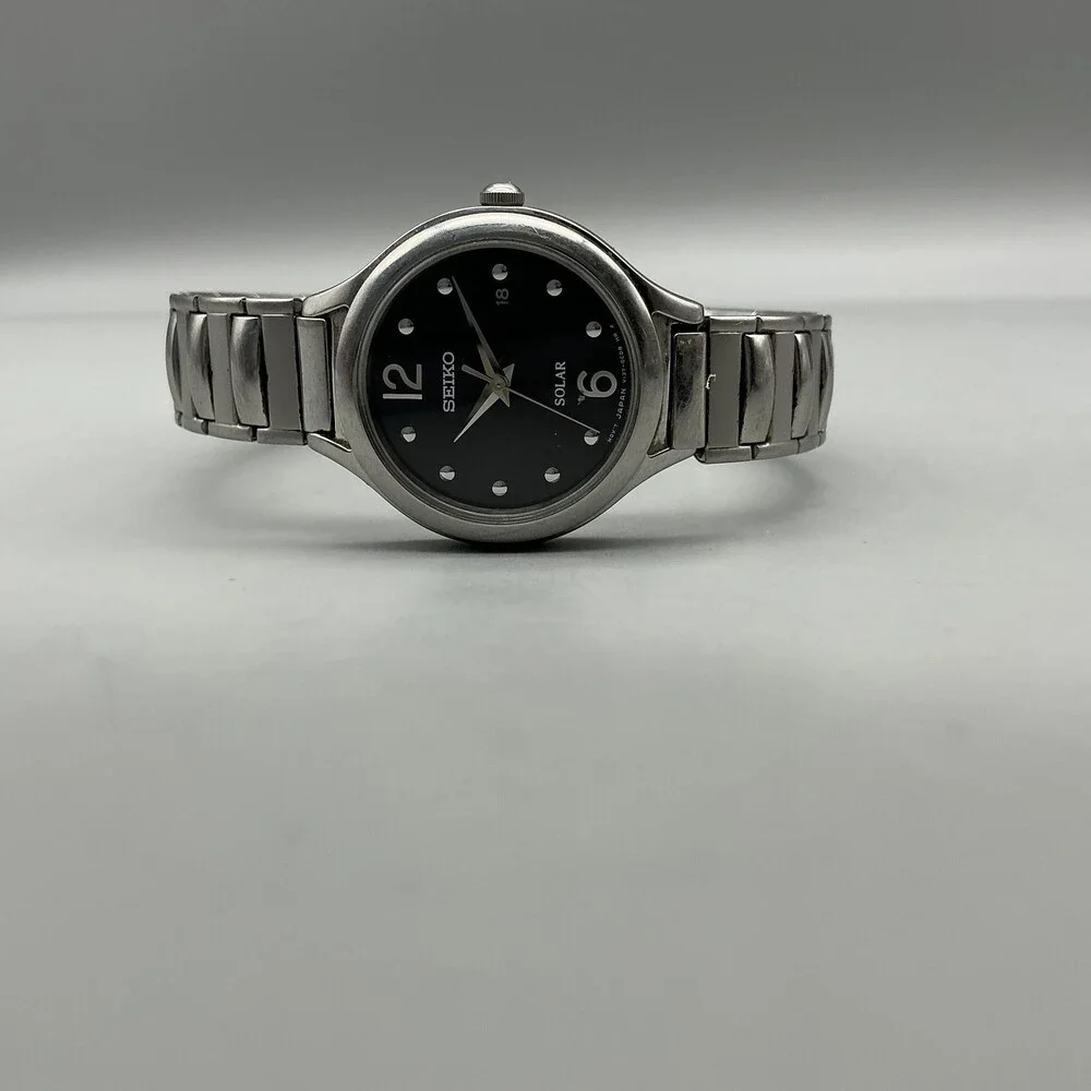 Seiko Solar Womens Watch 28mm Black Dial Silver Tone Stainless Stretch Bracelet